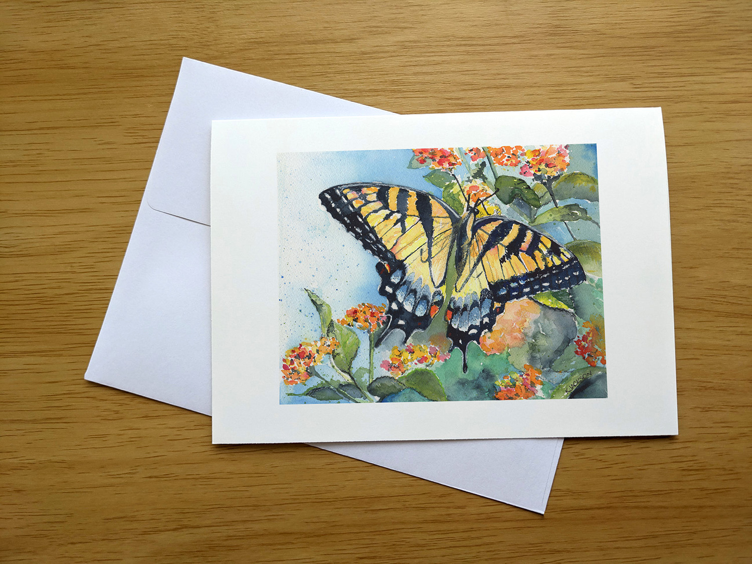 Swallowtail butterfly on Lantana greeting card front mockup Swallowtail butterfly on Lantana greeting card front mockup