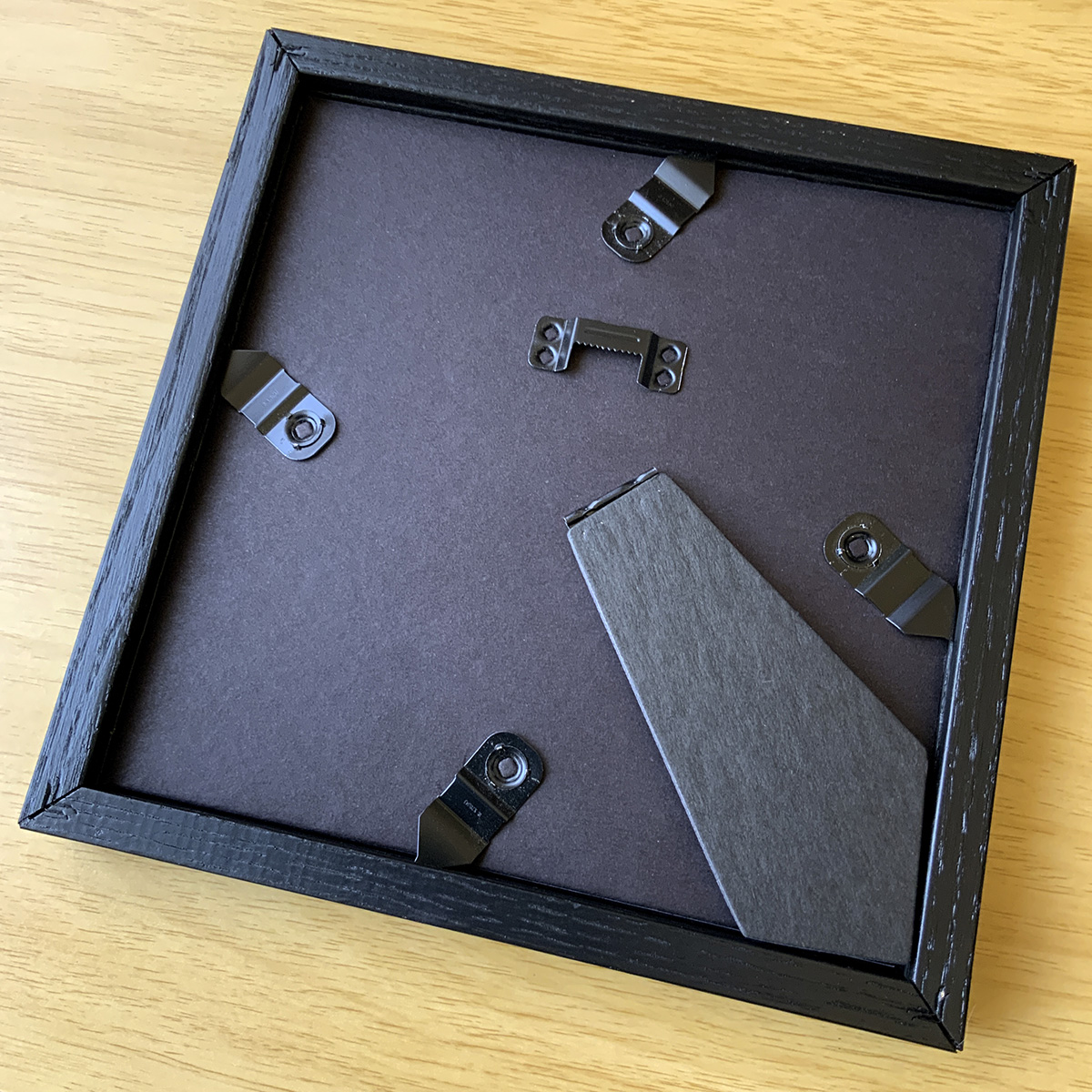 Premium Black Oak frame backing with hanging pins shown Premium Black Oak frame backing with hanging pins shown