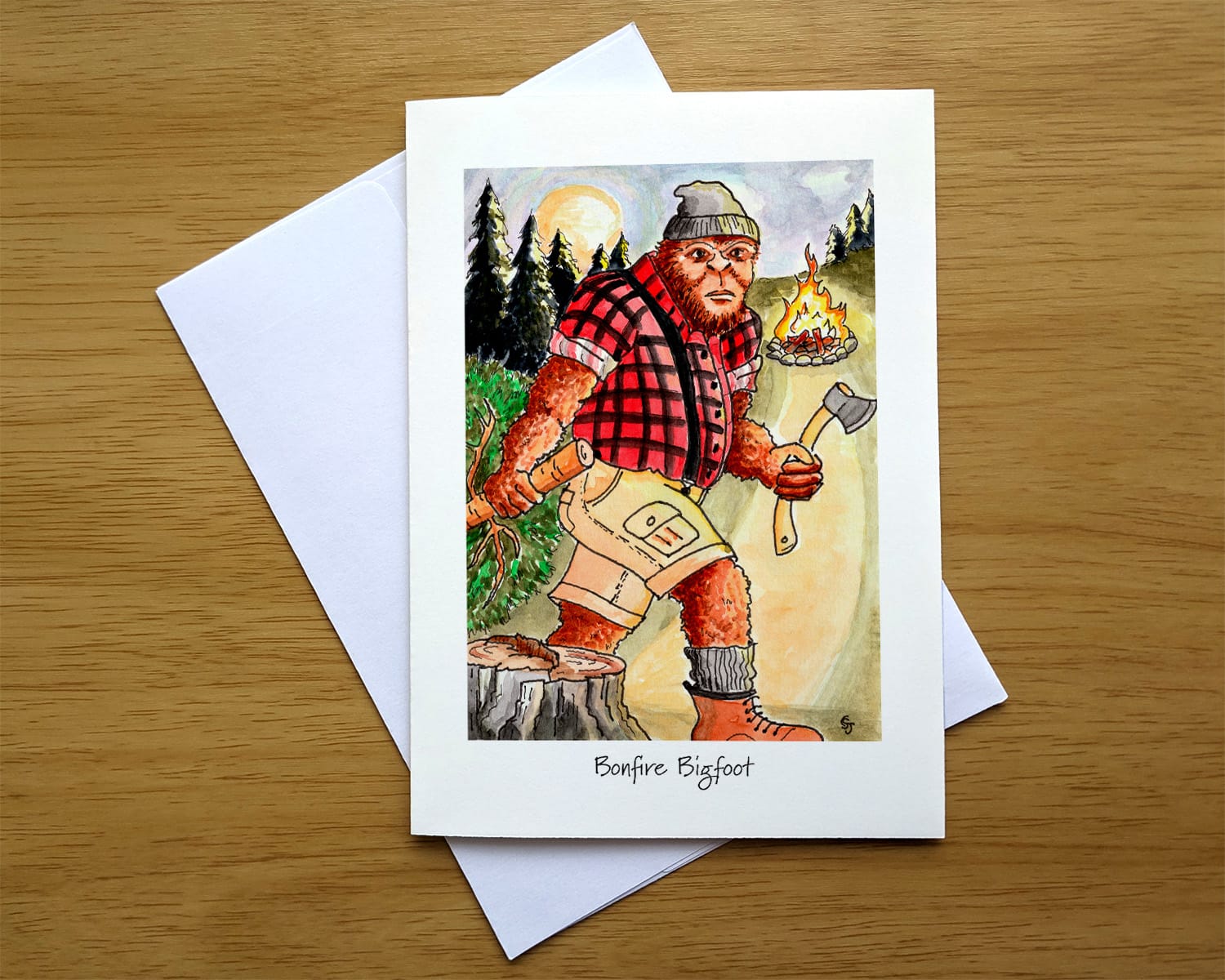 Bonfire Bigfoot greeting card front. Art by Colleen Scott-Jackson. Bonfire Bigfoot greeting card front. Art by Colleen Scott-Jackson.