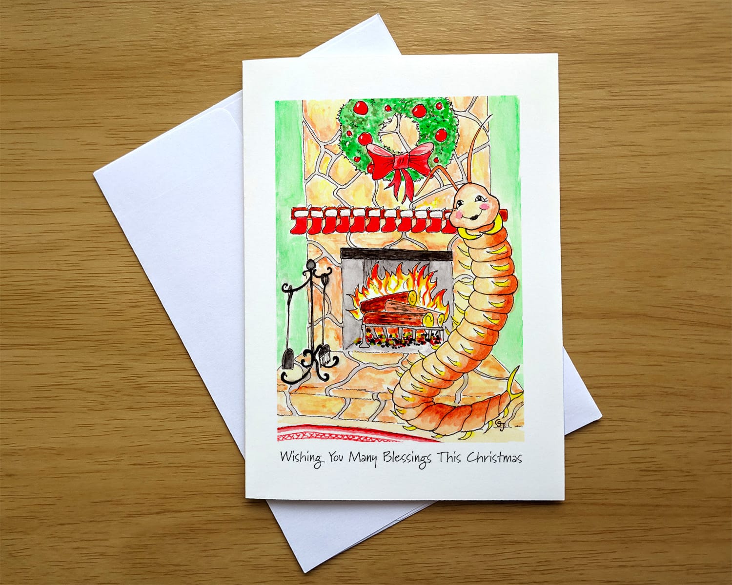 Centipede Stocking Christmas greeting card front. Art by Colleen Scott-Jackson. Centipede Stocking Christmas greeting card front. Art by Colleen Scott-Jackson.