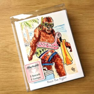 Bigfoot #1 Notecard Set front showing Beach Bum Bigfoot. All art is by Colleen Scott-Jackson.